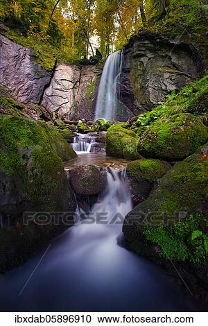 Waterfall in autumn forest, Finstersee, Canton Zug, Switzerland, Europe View Large Photo Image Stock Image - Waterfall in autumn forest, Finstersee, Canton Zug, Switzerland, Europe. Fotosearch