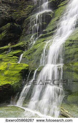 Waterfall on the west coast, water flowing over mossy rocks, Tintagel, Cornwall, United Kingdom, Europe View Large Photo Image Stock Photo - Waterfall on the west coast, water flowing over mossy rocks, Tintagel, Cornwall, United Kingdom, Europe. Fotosearch
