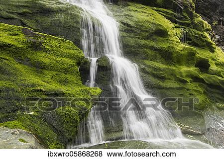 Waterfall on the west coast, water flowing over mossy rocks, Tintagel, Cornwall, United Kingdom, Europe View Large Photo Image Stock Photo - Waterfall on the west coast, water flowing over mossy rocks, Tintagel, Cornwall, United Kingdom, Europe. Fotosearch