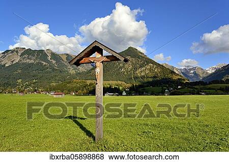 Way cross in the Loretto Meadows, panoramic view to the mountains near Oberstdorf, Rubihorn 1937m, Gaisalphorn 1953m, Schattenberg 1721m, Allgäu Alps, Allgäu, Bavaria, Germany, Europe View Large Photo Image Stock Photo - Way cross in the Loretto Meadows, panoramic view to the mountains near Oberstdorf, Rubihorn 1937m, Gaisalphorn 1953m, Schattenberg 1721m, Allgäu Alps, Allgäu, Bavaria, Germany, Europe. Fotosearch