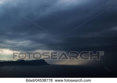 Stock Photo - Winding storm, dark clouds, view from the Cape Peninsula to False Bay, Western Cape, South Africa, Africa. Fotosearch