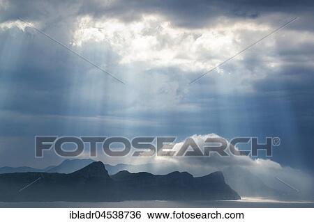 Stock Photograph - Winding storm, dark clouds, view from the Cape Peninsula to False Bay, Western Cape, South Africa, Africa. Fotosearch