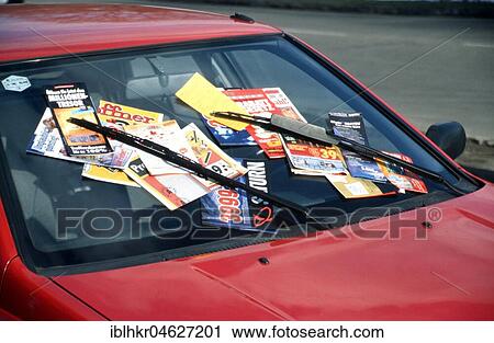 Stock Image - Windscreen full of advertising, Berlin, Germany, Europe. Fotosearch