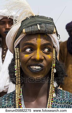 Wodaabe-Bororo man with face painted at the annual Gerewol festival, courtship ritual competition among the Fulani ethnic group, Niger, Africa View Large Photo Image Stock Photography - Wodaabe-Bororo man with face painted at the annual Gerewol festival, courtship ritual competition among the Fulani ethnic group, Niger, Africa. Fotosearch