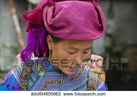 Woman in traditional dress of the Flower Hmong, Sunday market, Bac Ha, North Vietnam, Vietnam, Asia View Large Photo Image Stock Image - Woman in traditional dress of the Flower Hmong, Sunday market, Bac Ha, North Vietnam, Vietnam, Asia. Fotosearch