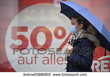 Woman with face mask, umbrella, shopping, SALE, discount battle, discounts, corona crisis, Stuttgart, Baden-Württemberg, Germany, Europe View Large Photo Image Stock Image - Woman with face mask, umbrella, shopping, SALE, discount battle, discounts, corona crisis, Stuttgart, Baden-Württemberg, Germany, Europe. Fotosearch