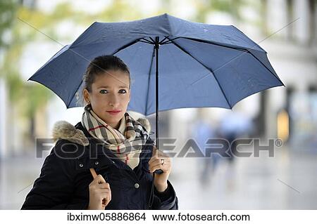 Woman with umbrella, portrait, Stuttgart, Baden-Württemberg, Germany, Europe View Large Photo Image Picture - Woman with umbrella, portrait, Stuttgart, Baden-Württemberg, Germany, Europe. Fotosearch
