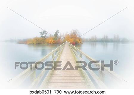 Wooden bridge to Werd Island with Franciscan monastery St. Otmar near Stein am Rhein, Eschenz municipality, Canton Thurgau, Switzerland, Europe View Large Photo Image Stock Image - Wooden bridge to Werd Island with Franciscan monastery St. Otmar near Stein am Rhein, Eschenz municipality, Canton Thurgau, Switzerland, Europe. Fotosearch