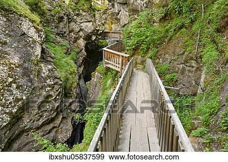 Stock Photo - Wooden footbridge through the Gorner Gorge, Zermatt, Canton Valais, Switzerland, Europe. Fotosearch