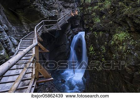 Wooden trail through the Ragga Gorge, Flattach, Mölltal, Carinthia, Austria, Europe View Large Photo Image Stock Photo - Wooden trail through the Ragga Gorge, Flattach, Mölltal, Carinthia, Austria, Europe. Fotosearch