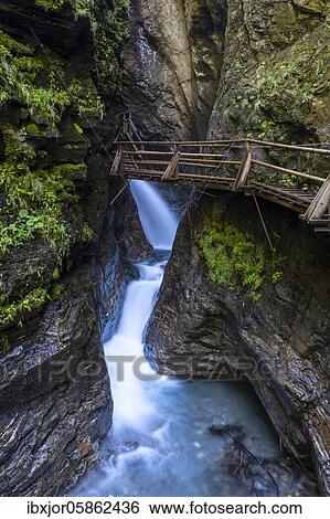 Wooden trail through the Ragga Gorge, Flattach, Mölltal, Carinthia, Austria, Europe View Large Photo Image Stock Photograph - Wooden trail through the Ragga Gorge, Flattach, Mölltal, Carinthia, Austria, Europe. Fotosearch
