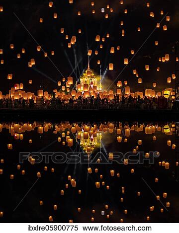 Yi Peng Festival with rising lanterns and a reflection in the lake, Chiang Mai, Thailand, Asia View Large Photo Image Stock Photography - Yi Peng Festival with rising lanterns and a reflection in the lake, Chiang Mai, Thailand, Asia. Fotosearch