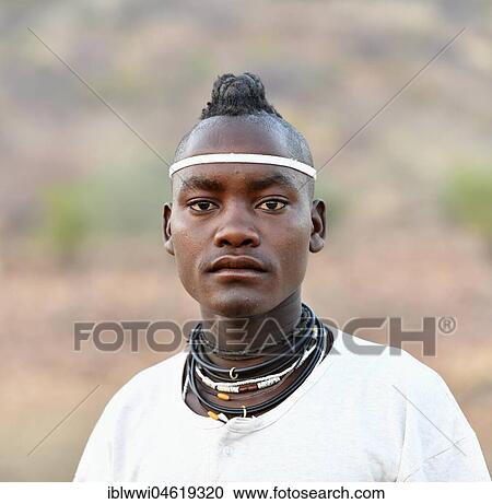 Stock Image - Young Himba man, Portrait, Kaokoveld, Namibia, Africa. Fotosearch