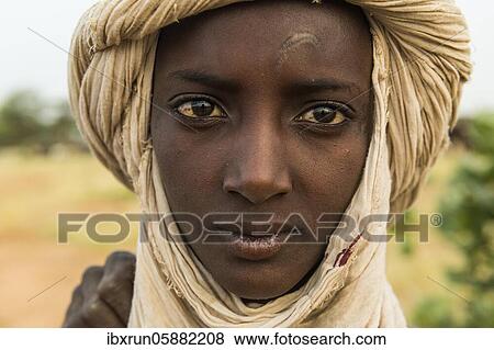 Young Peul man, Gerewol festival, courtship ritual competition among the Fulani ethnic group, Niger, Africa View Large Photo Image Stock Photo - Young Peul man, Gerewol festival, courtship ritual competition among the Fulani ethnic group, Niger, Africa. Fotosearch