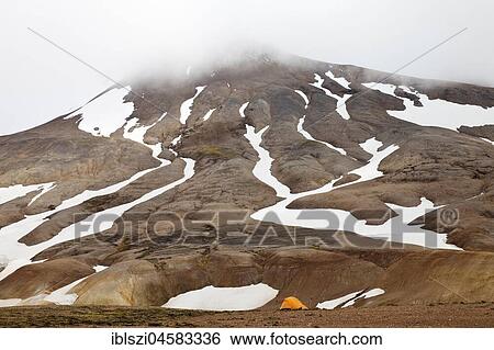A tent on a snow-covered rhyolite mountain, high temperature area Hveradalir, Kerlingarfjöll, Island View Large Photo Image Stock Photograph - A tent on a snow-covered rhyolite mountain, high temperature area Hveradalir, Kerlingarfjöll, Island. Fotosearch