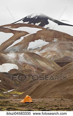 A tent on a snow-covered rhyolite mountain, high temperature area Hveradalir, Kerlingarfjöll, Island View Large Photo Image Stock Photography - A tent on a snow-covered rhyolite mountain, high temperature area Hveradalir, Kerlingarfjöll, Island. Fotosearch