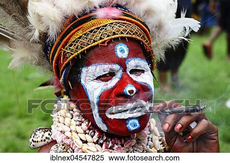 Aboriginal people, portrait, painted with headdress, smoking, highland tribe War Kang, Sing-Sing Festival, Goroka, Papua New Guinea, Oceania View Large Photo Image Stock Photography - Aboriginal people, portrait, painted with headdress, smoking, highland tribe War Kang, Sing-Sing Festival, Goroka, Papua New Guinea, Oceania. Fotosearch