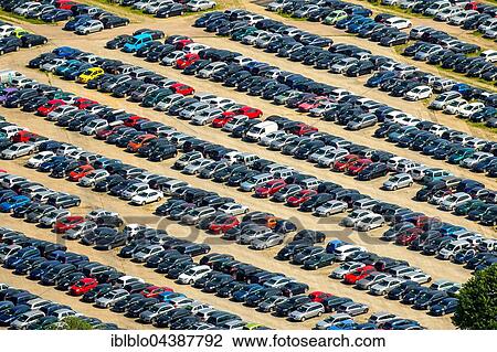 Stock Image - Aerial photograph, new car parking lot, Citroen, Peugeot, Ford, colourful rows of cars, Wallenius Wilhelmsen Logistics, Zülpich, Rhineland, North Rhine-Westphalia, Germany, Europe. Fotosearch