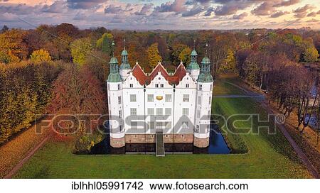 Stock Image - Aerial view, drone photo, of Schloss Ahrensburg in autumn, Germany, Europe. Fotosearch