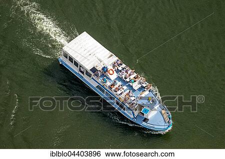 Aerial view, excursion boat on Reeck Canal, Waren, Mecklenburg Lake District, Mecklenburg-Western Pomerania, Germany, Europe View Large Photo Image Stock Photograph - Aerial view, excursion boat on Reeck Canal, Waren, Mecklenburg Lake District, Mecklenburg-Western Pomerania, Germany, Europe. Fotosearch