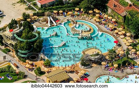Aerial view of Piani di Clodia Camping, campsite, swimming pool and sun terrace with parasols, campers, Lake Garda, Lazise, Veneto, Italy, Europe View Large Photo Image Stock Image - Aerial view of Piani di Clodia Camping, campsite, swimming pool and sun terrace with parasols, campers, Lake Garda, Lazise, Veneto, Italy, Europe. Fotosearch