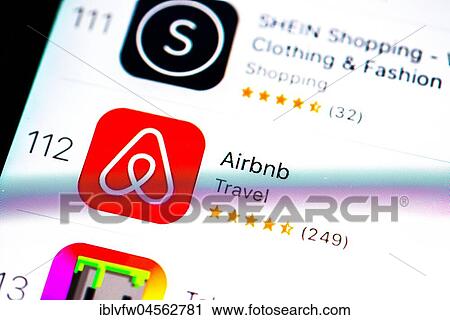 Stock Image - Airbnb App in the Apple App Store, app icon, holiday homes, display on a screen from mobile phone, iPhone, iOS, smartphone, macro recording, detail, full size. Fotosearch