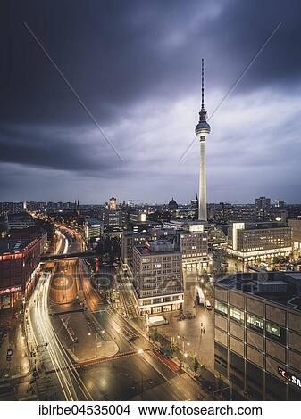 Picture - Alexanderplatz and Berlin television tower, blue hour, thunderstorm, Berlin, Germany, Europe. Fotosearch
