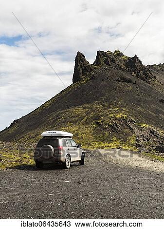 All-terrain vehicle with roof tent next to gravel road on Stapafell mountain, barren volcanic landscape, Arnarstapi, Snæfellsnes peninsula, Iceland, Europe View Large Photo Image Stock Image - All-terrain vehicle with roof tent next to gravel road on Stapafell mountain, barren volcanic landscape, Arnarstapi, Snæfellsnes peninsula, Iceland, Europe. Fotosearch