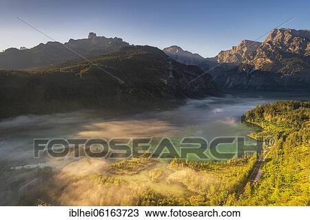Stock Image - Almsee im Nebel, Totes Gebirge, Almtal, Salzkammergut, Upper Austria, Austria, Europe. Fotosearch