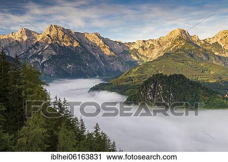 Stock Image - Almsee im Nebel, Totes Gebirge, Almtal, Salzkammergut, Upper Austria, Austria, Europe. Fotosearch