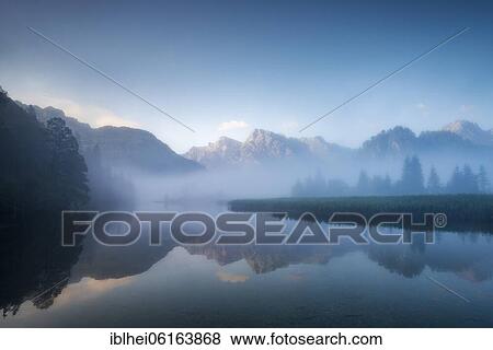 Stock Photo - Almsee im Nebel, Totes Gebirge, Almtal, Salzkammergut, Upper Austria, Austria, Europe. Fotosearch