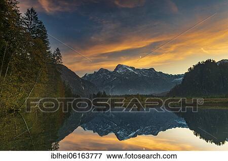 Almsee in autumn, evening light, Totes Gebirge, Almtal, Salzkammergut, Upper Austria, Austria, Europe View Large Photo Image Stock Photo - Almsee in autumn, evening light, Totes Gebirge, Almtal, Salzkammergut, Upper Austria, Austria, Europe. Fotosearch
