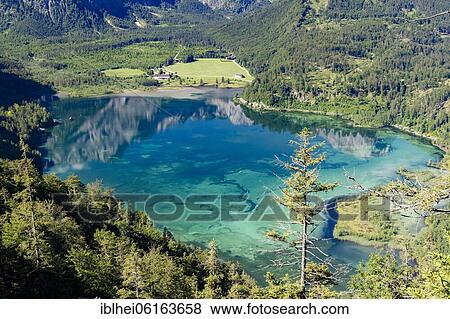 Almsee Lake, Totes Gebirge mountain range, Almtal Valley, Salzkammergut, Upper Austria, Austria, Europe View Large Photo Image Stock Photo - Almsee Lake, Totes Gebirge mountain range, Almtal Valley, Salzkammergut, Upper Austria, Austria, Europe. Fotosearch