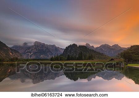 Almsee with sunset, Totes Gebirge, Almtal, Salzkammergut, Upper Austria, Austria, Europe View Large Photo Image Picture - Almsee with sunset, Totes Gebirge, Almtal, Salzkammergut, Upper Austria, Austria, Europe. Fotosearch