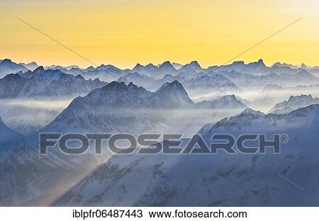 Alps, on the summit of the Zugspitze in winter, Bavaria, Germany, Europe View Large Photo Image Stock Image - Alps, on the summit of the Zugspitze in winter, Bavaria, Germany, Europe. Fotosearch