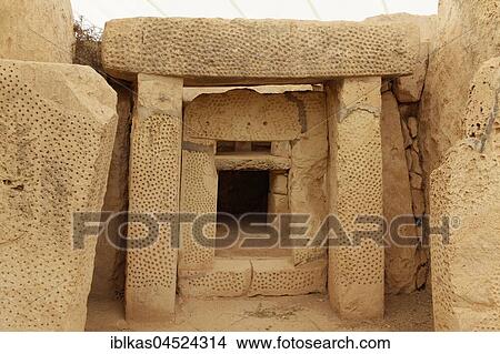 Altar niche with dotted decor, prehistoric temple complex Mnajdra, Megalith temple, Qrendi, Malta, Europe View Large Photo Image Picture - Altar niche with dotted decor, prehistoric temple complex Mnajdra, Megalith temple, Qrendi, Malta, Europe. Fotosearch