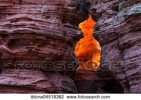 Stock Image - Altschlossfelsen glowing orange-red through the inciding sun, sandstone, Eppenbrunn, Rhineland-Palatinate, Germany, Europe. Fotosearch