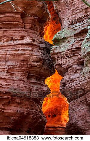 Stock Image - Altschlossfelsen glowing orange-red through the inciding sun, sandstone, Eppenbrunn, Rhineland-Palatinate, Germany, Europe. Fotosearch