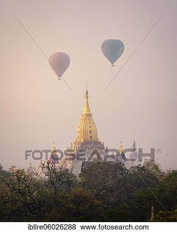 Ananda Temple with two colorful balloons, Old Bagan, Myanmar, Asia View Large Photo Image Stock Photo - Ananda Temple with two colorful balloons, Old Bagan, Myanmar, Asia. Fotosearch