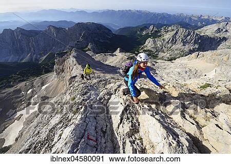 Stock Image - Ascent from the Planika pod Triglavom Refuge to the Triglav Peak, Triglav National Park, Julian Alps, Slovenia, Europe. Fotosearch