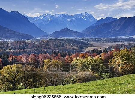 Stock Photograph - Autumn landscape above the Murnauer moss with Zugspitze group near Hagen, district of Murnau, The Blue Land, Upper Bavaria, Bavaria, Germany, Europe. Fotosearch