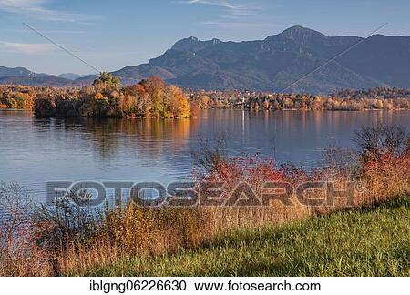 Autumn landscape at Staffelsee with Mühlwörth Island, Herzogstand and Heimgarten, Uffing am Staffelsee, The Blue Land, Upper Bavaria, Bavaria, Germany, Europe View Large Photo Image Stock Image - Autumn landscape at Staffelsee with Mühlwörth Island, Herzogstand and Heimgarten, Uffing am Staffelsee, The Blue Land, Upper Bavaria, Bavaria, Germany, Europe. Fotosearch