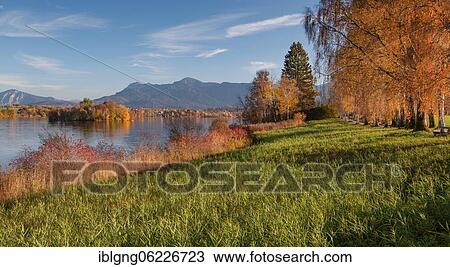 Stock Image - Autumn landscape at Staffelsee with Mühlwörth Island, Herzogstand and Heimgarten, Uffing am Staffelsee, The Blue Land, Upper Bavaria, Bavaria, Germany, Europe. Fotosearch