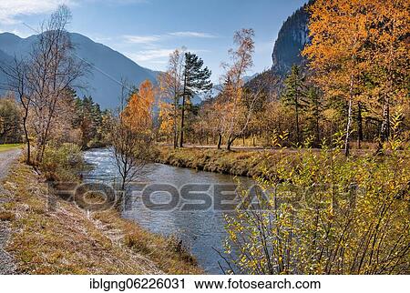Stock Image - Autumn landscape at the Ammer, Oberammergau, Ammertal, Ammergau Alps, Upper Bavaria, Bavaria, Germany, Europe. Fotosearch