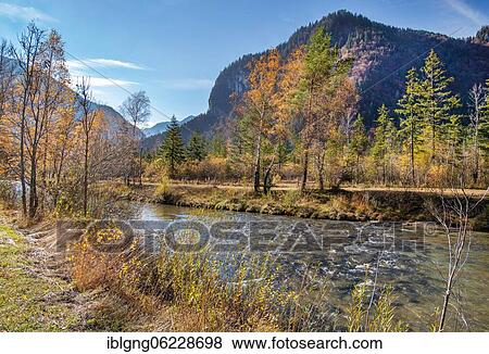 Stock Photo - Autumn landscape at the Ammer, Oberammergau, Ammertal, Ammergau Alps, Upper Bavaria, Bavaria, Germany, Europe. Fotosearch