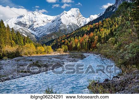 Stock Image - Autumn landscape in the Rißtal with Rißbach near the Großer Ahornboden, Engalpe, Eng, community Hinterriß, Karwendel Mountains, Alpenpark Karwendel, Tyrol, Austria, Europe. Fotosearch