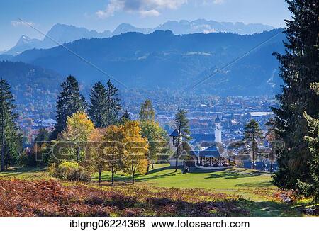 Autumn landscape on the Kramerplateauweg with a view of the village and the Karwendel Mountains, Garmisch-Partenkirchen, Loisachtal, Werdenfelser Land, Upper Bavaria, Bavaria, Germany, Europe View Large Photo Image Stock Photo - Autumn landscape on the Kramerplateauweg with a view of the village and the Karwendel Mountains, Garmisch-Partenkirchen, Loisachtal, Werdenfelser Land, Upper Bavaria, Bavaria, Germany, Europe. Fotosearch