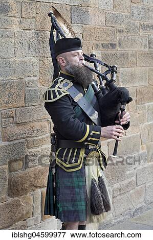 Bagpipe player, Castle Hill, Edinburgh, Scotland, Great Britain View Large Photo Image Stock Photo - Bagpipe player, Castle Hill, Edinburgh, Scotland, Great Britain. Fotosearch