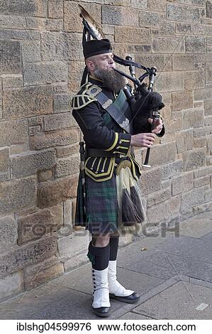 Stock Photograph - Bagpipe player, Castle Hill, Edinburgh, Scotland, Great Britain. Fotosearch