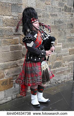 Stock Photo - Bagpipe player, Edinburgh, Scotland, UK. Fotosearch
